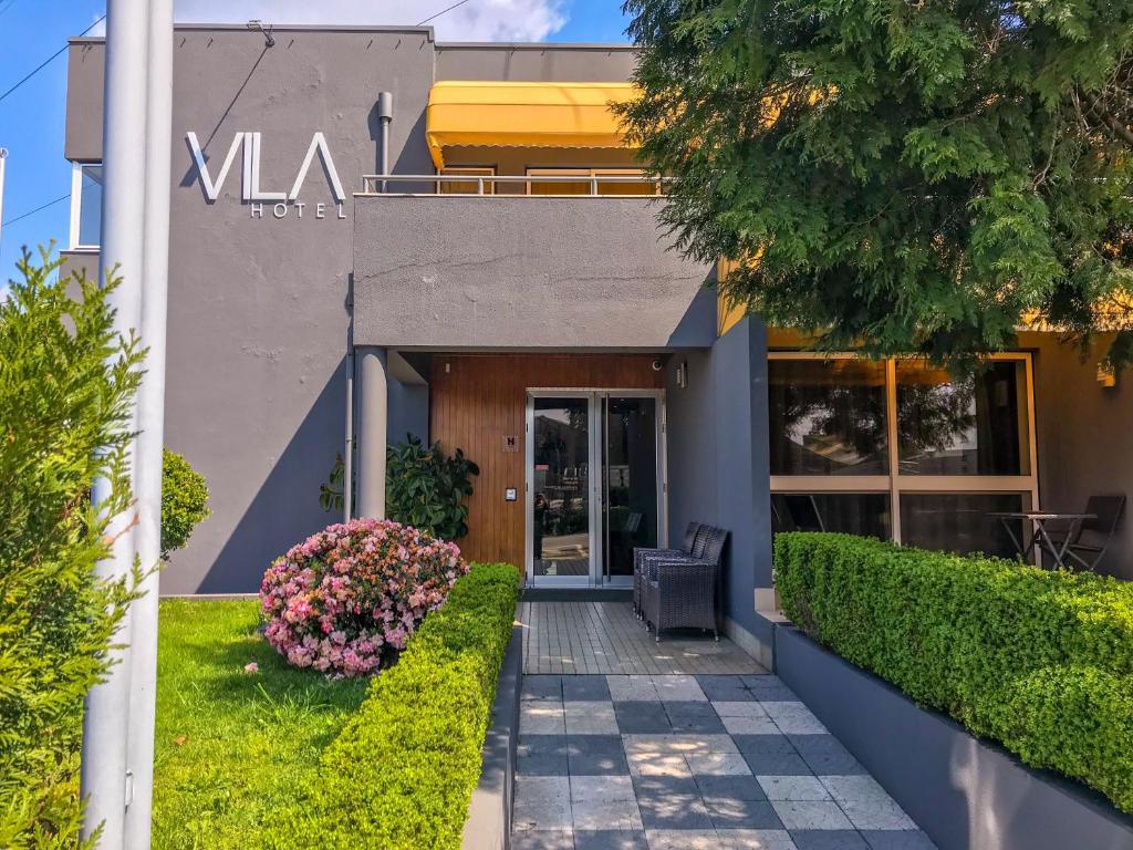 Vila Hotel by VimaHotels — abrir site ou reservas